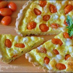 Torta salata con pomodorini, basilico e formaggio di capra