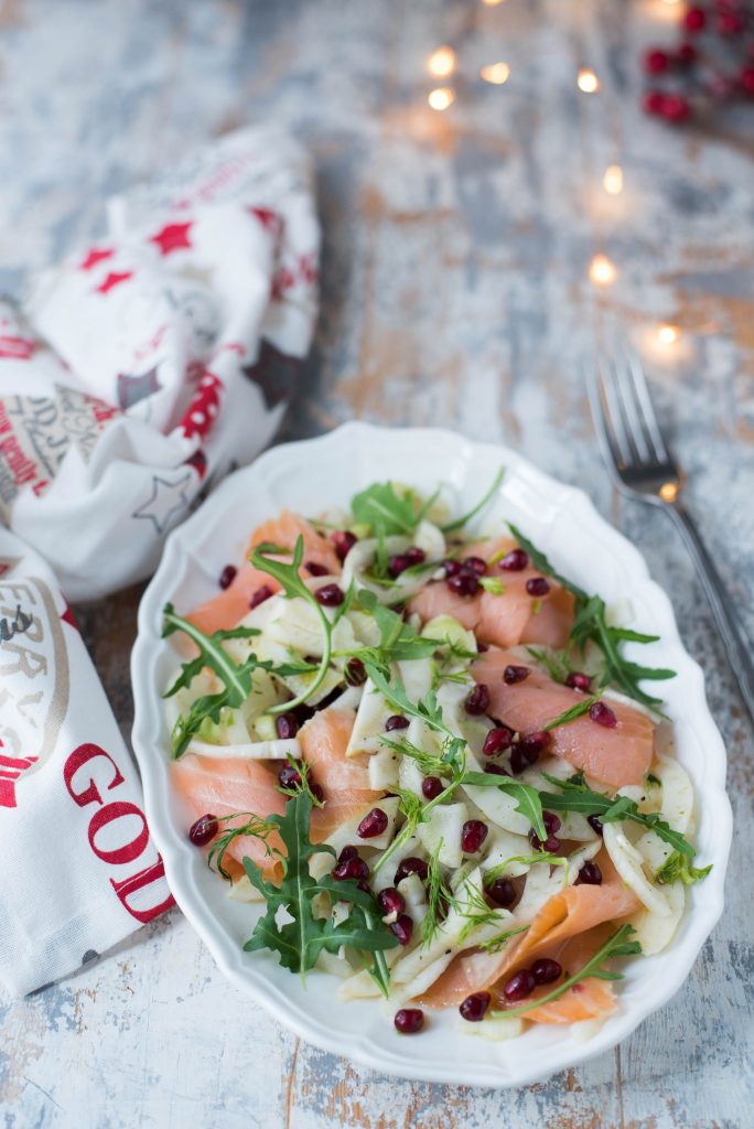 Carpaccio di finocchi salmone e melagrana